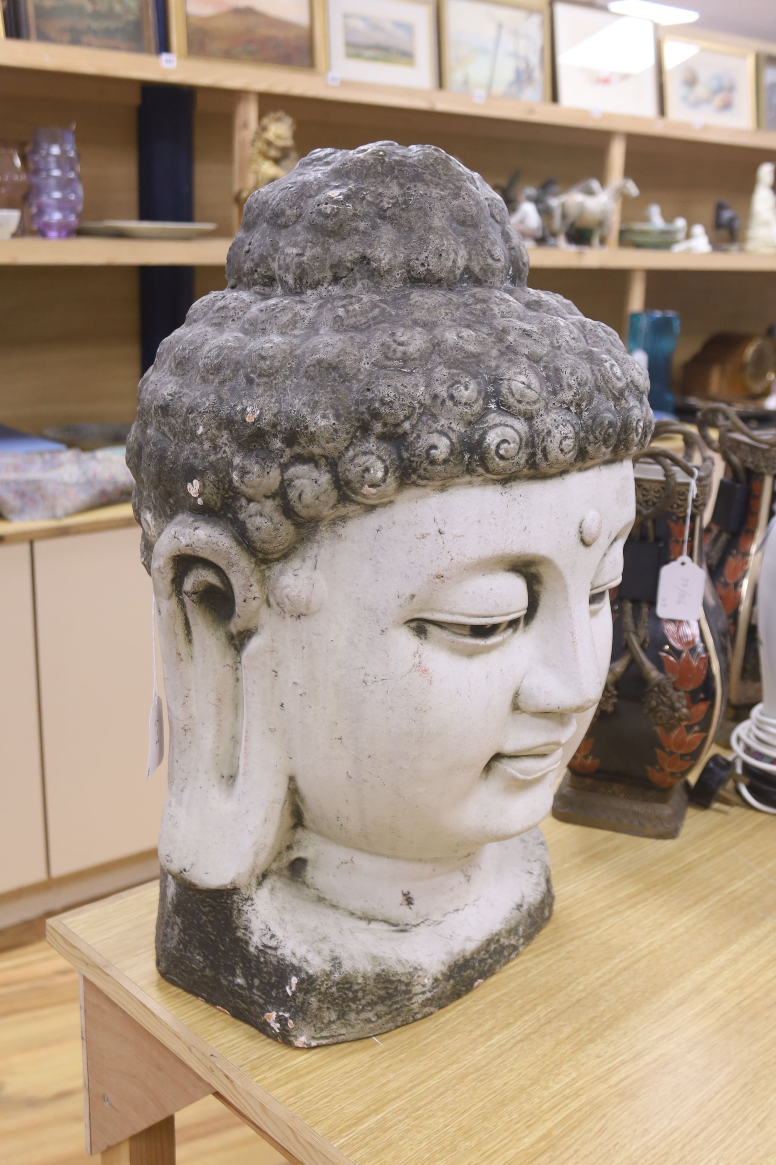 A large white painted terracotta Buddha head, height 57cm